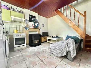 Ensemble immobilier de 5 maisons avec cour à idéalement à...