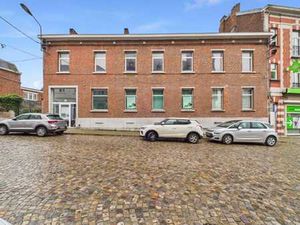 Immeuble ±645 m² : commerce  appart  garages & parkings