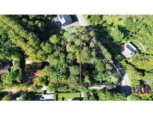 Superbe terrain boisé de +/- 15ares avec avis de principe