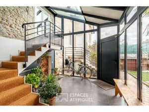 Maison de caractère avec véranda cathédrale et jardin intimiste