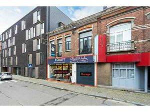 Surface commerciale avec garage et grand atelier