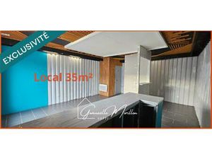 2 locaux commerciaux et 1 habitation.