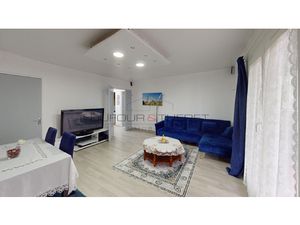 Vaste appartement avec balcon  cave et place de parking à ve