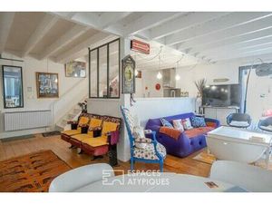 Maison-loft cachée avec jardin au coeur d'un ancien atelier