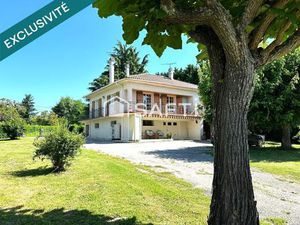 Propriété avec dépendance et grand terrain