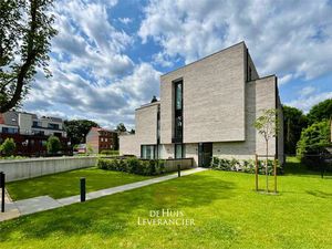 Discrete luxe & tijdloze elegantie : subliem nieuwbouwappartement met terras en gemeenscha