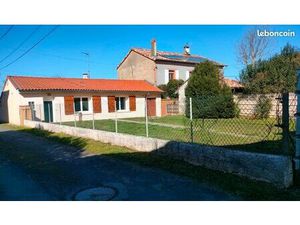 Maison avec garage et jardin