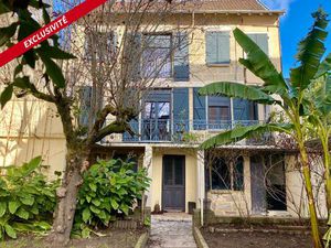 Maison centre ville avec garage et place de parking