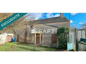 Maison en pierre à réhabiliter  3 pièces +grenier avec terrain en bord de ruisseau