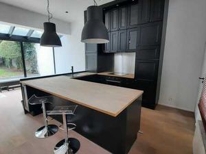 Magnifique arrière-maison avec jardin