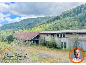 Bâtiment Industriel avec 16 000 m² de Terrain Constructible en Zone Industrielle