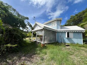 Maison T3 en bois de style créole  vue mer