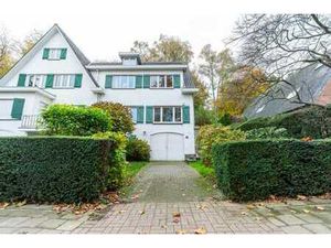 Maison 5 chambres avec jardin dans quartier résidentiel