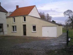 Maison 3 façades avec garage