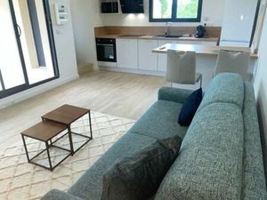 Studio neuf de standing + parking et terrasse