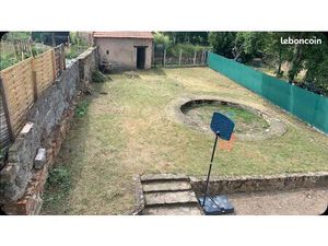 Maison à louer avec garage et terrain