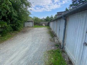 Immeuble 2 T3 et 24 garages tous loués