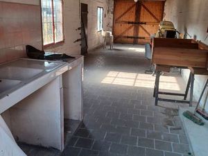 Garage + cour à louer