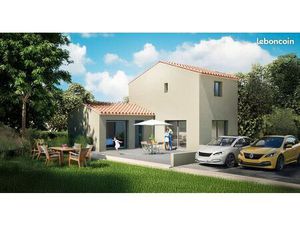Maison T4 en duplex  jardin et stationnements 