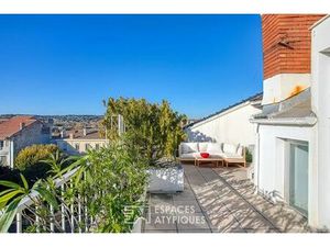 Appartement d'exception à rénover avec son rooftop dans un quartier prisé