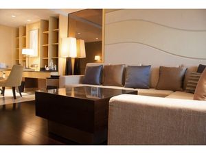 Terrasses généreuses et séjour lumineux en étage élevé