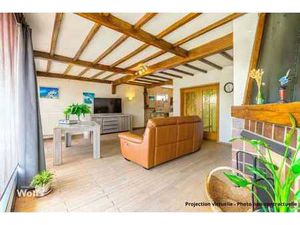 Bien contenant une habitation  garage de +/- 84 m² et jardin