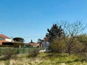 Terrain plat Décines  proche canal Jonage