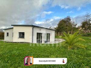 Plain-pied contemporain avec jardin à proximité du bourg