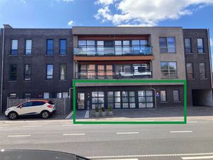 Modern gelijkvloersappartement + tuin & garage op toplocatie