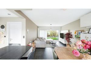 Halfopen woning met 2 garages en tuin te Heist