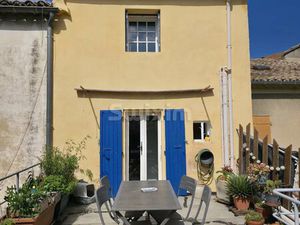 Immeuble avec surface commerciale et logement avec terrasse