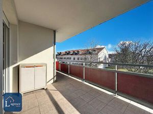 Appartement T4 traversant avec balcon et garage en plein centre