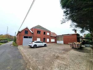 Rustig gelegen woning met grote loods van 480m² op een pe...