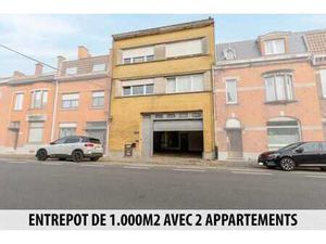 Immeuble avec entrepôt de 1.000M2 et 2 appartements !