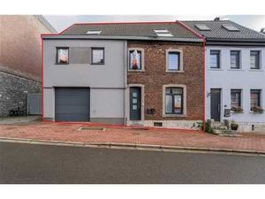 Maison 3 façades comprenant 2 habitations