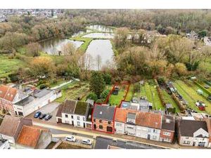Bien (bi)familial avec 3 à 5 ch.  jardin et oasis de verdure