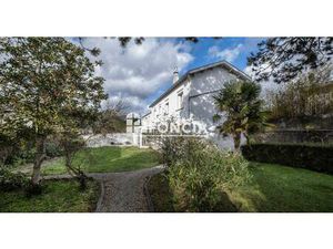 Maison familiale avec piscine  jardin arboré et potentiel d'agrandissement
