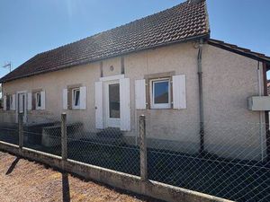 Maison de bourg avec garage et terrain