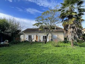 Maison individuelle avec jardin et garage