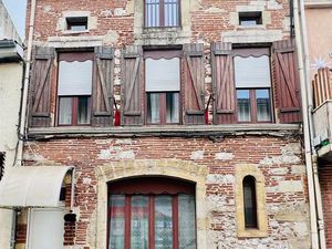 Immeuble à usage d'habitation et local commercial