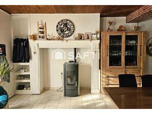 ENSEMBLE IMMOBILIER COMPOSE DE TROIS LOGEMENTS LOUES