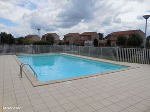 Grand T2 avec terrasse proche des commerces