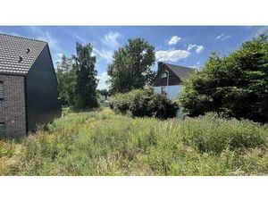 Beau terrain à bâtir au calme et proche des facilités