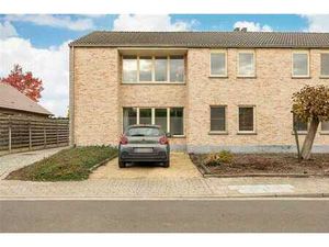 Gelijkvloers appartement met privatieve tuin!