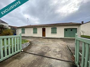 Plain-pied de trois chambres avec jardin et garages