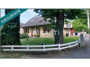 Maison individuelle avec véranda  garage et jardin