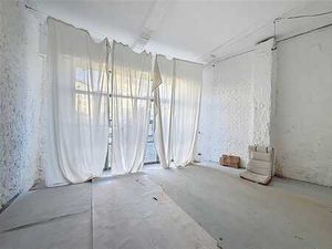 Rez-de-chaussée commercial de +/- 450m²