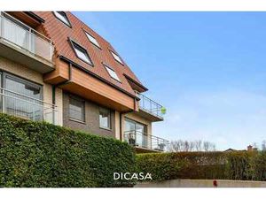 Lichtrijk duplexappartement met 2 slaapkamers  garage en ...