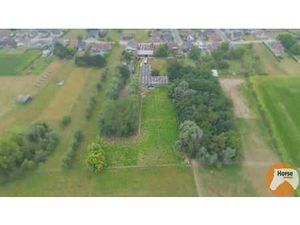 ERPE-MERE - Goed onderhouden woning met magazijn en serres