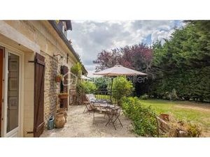 Magnifique longère de caractère avec beau terrain  véranda  annexes et grange sur la commu